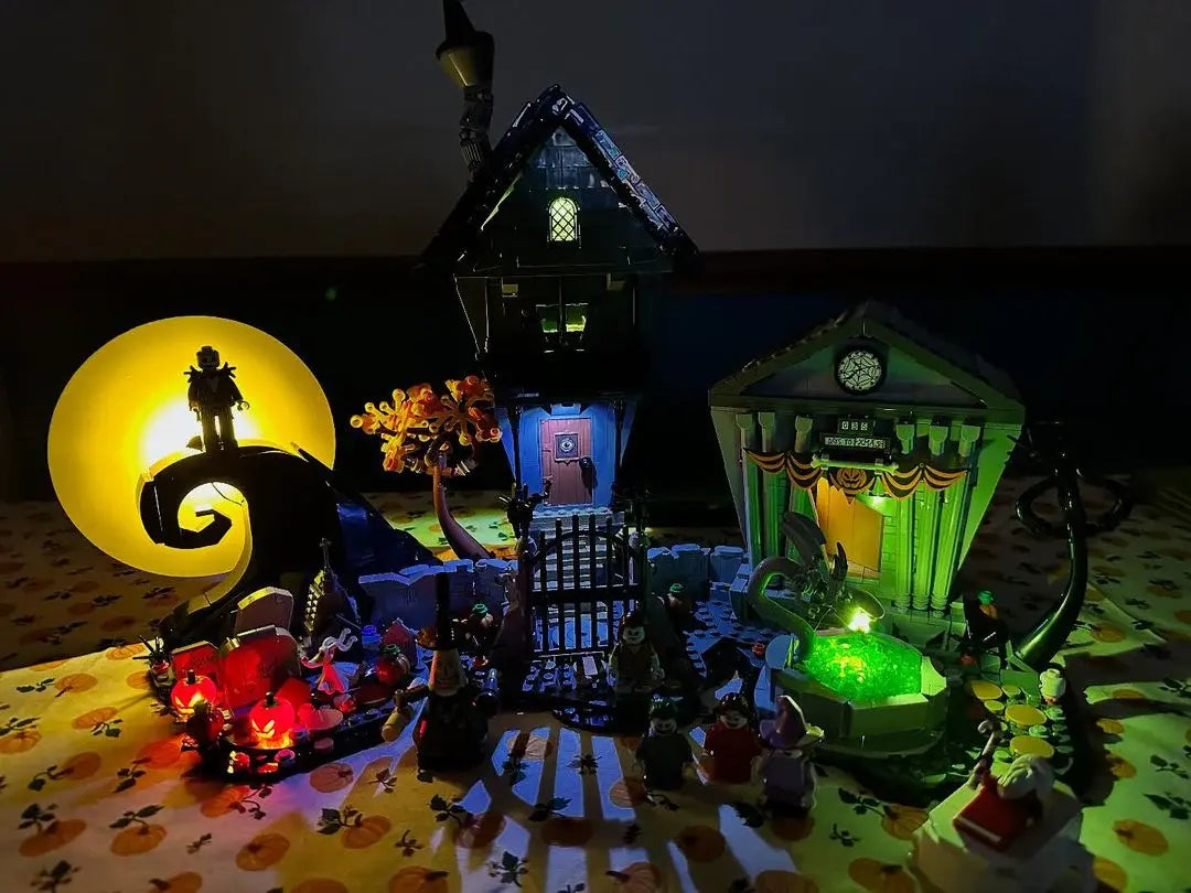 LEGO® Disney Tim Burton's The Nightmare Before Christmas setup with spooky LED lights – BrightMyBricks community build.