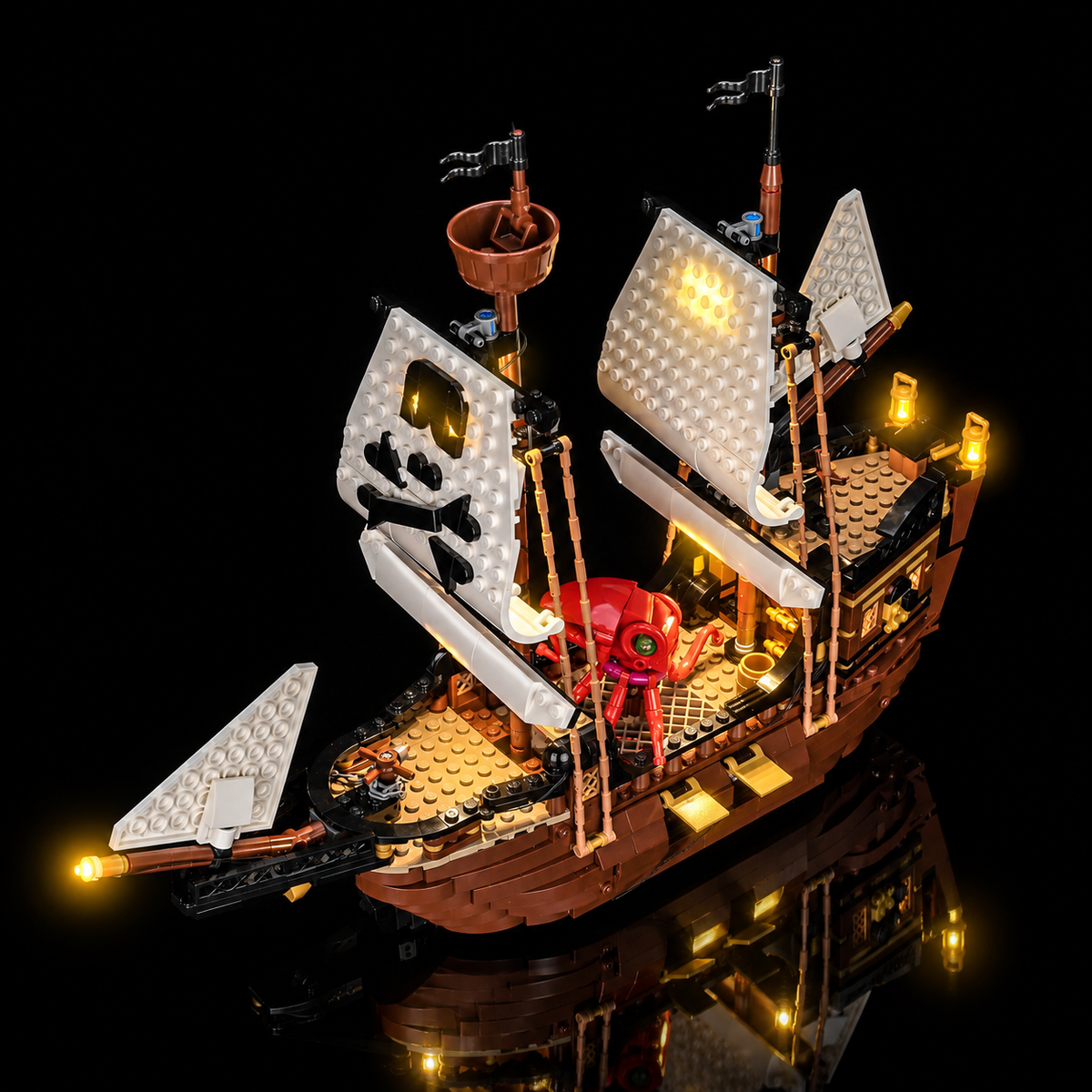 Overhead view of LEGO Iconic Pirate Ship 31387 showing the lit deck, sails and red octopus