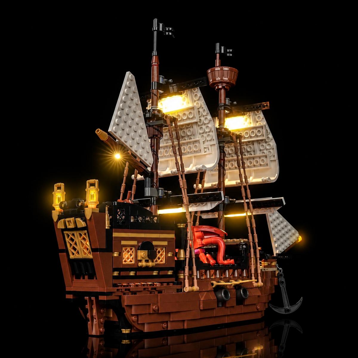 Stern view of LEGO Iconic Pirate Ship 31387 with warm cabin windows and twin lanterns