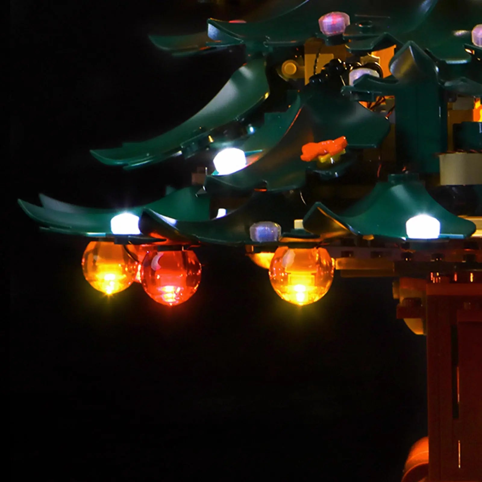 A side profile of the fully lit LEGO Christmas Tree, showing the beautiful 360-degree distribution of our custom lights.