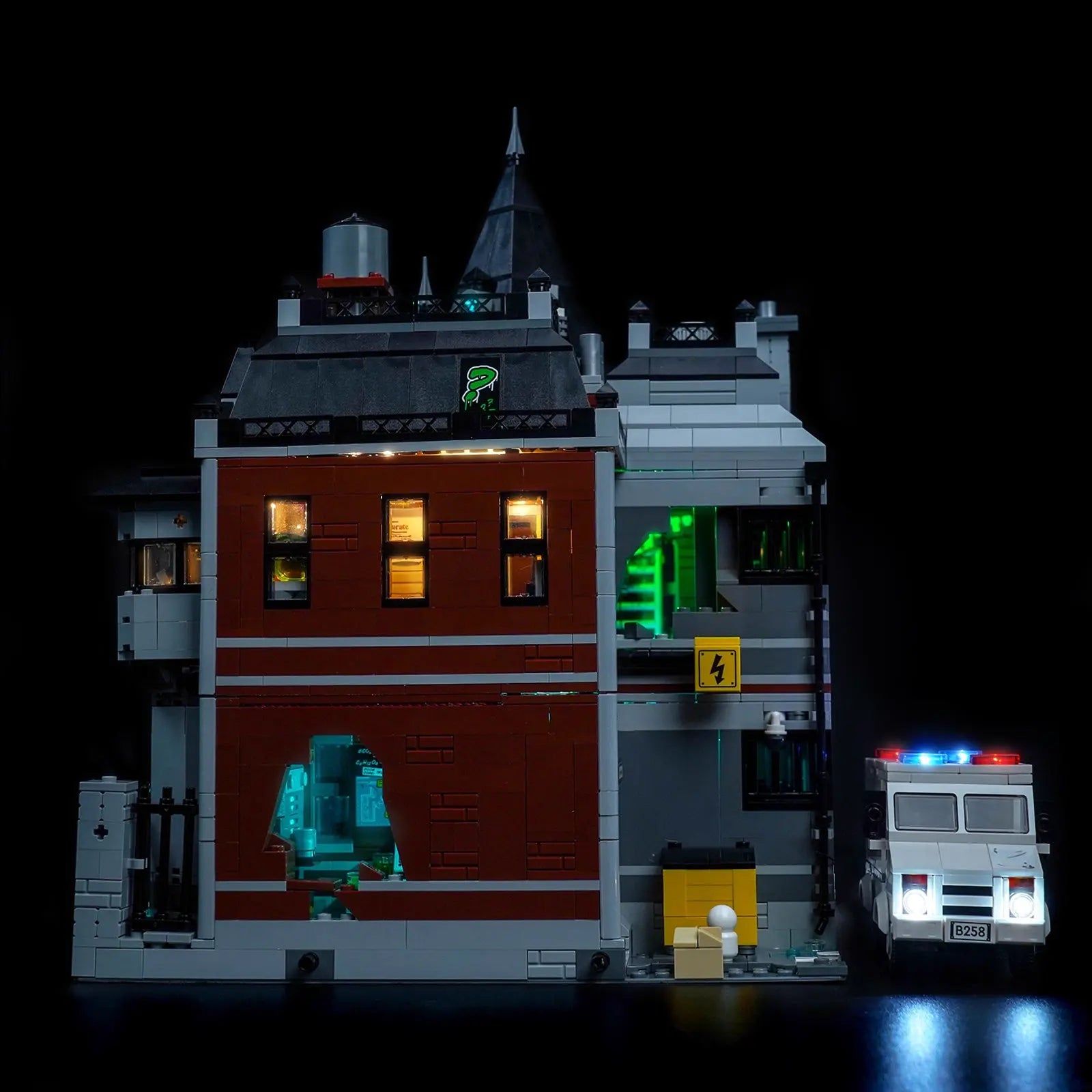 The LEGO Batman Arkham Asylum 76300 set illuminated with our new version light kit, creating a chilling and atmospheric glow.
