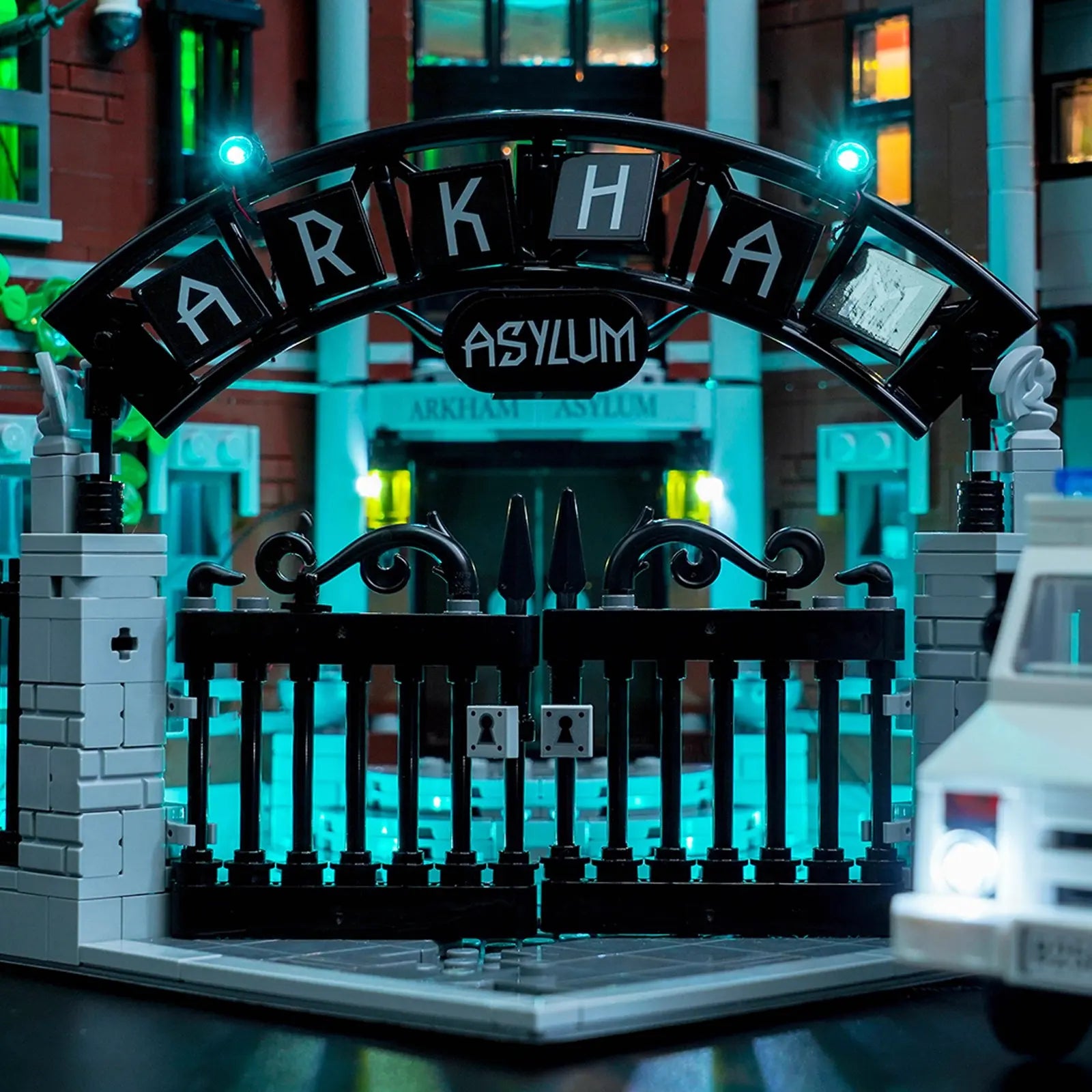 A detailed view of the asylum's rooftop, with security features and antennas picked out by our new version lighting.

