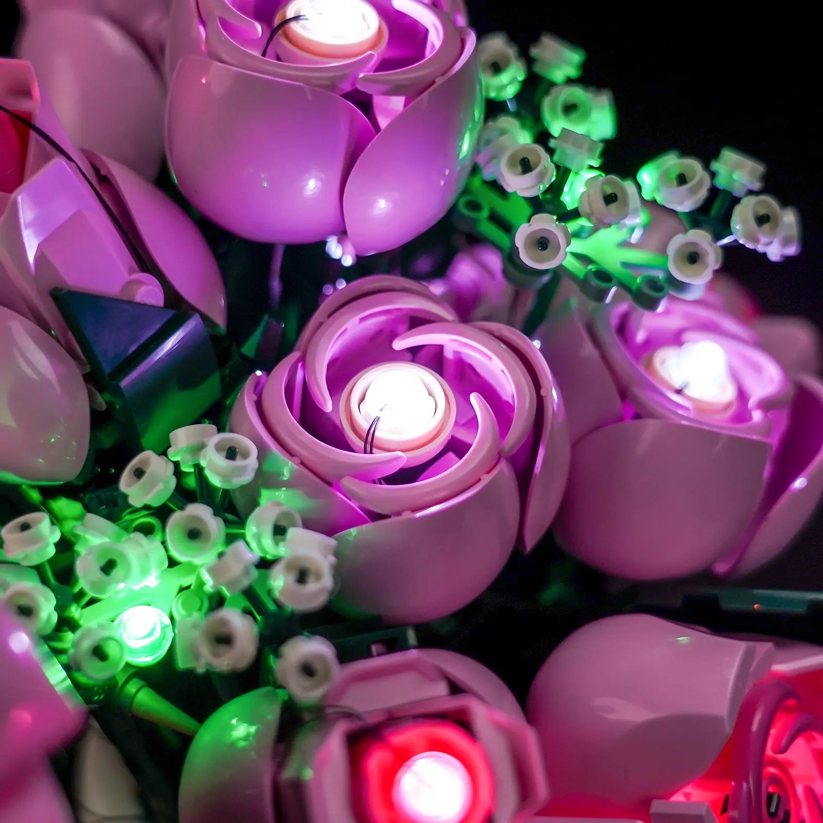 An overhead view of the LEGO 10374 bouquet, showing the beautiful arrangement of all the illuminated pink roses.