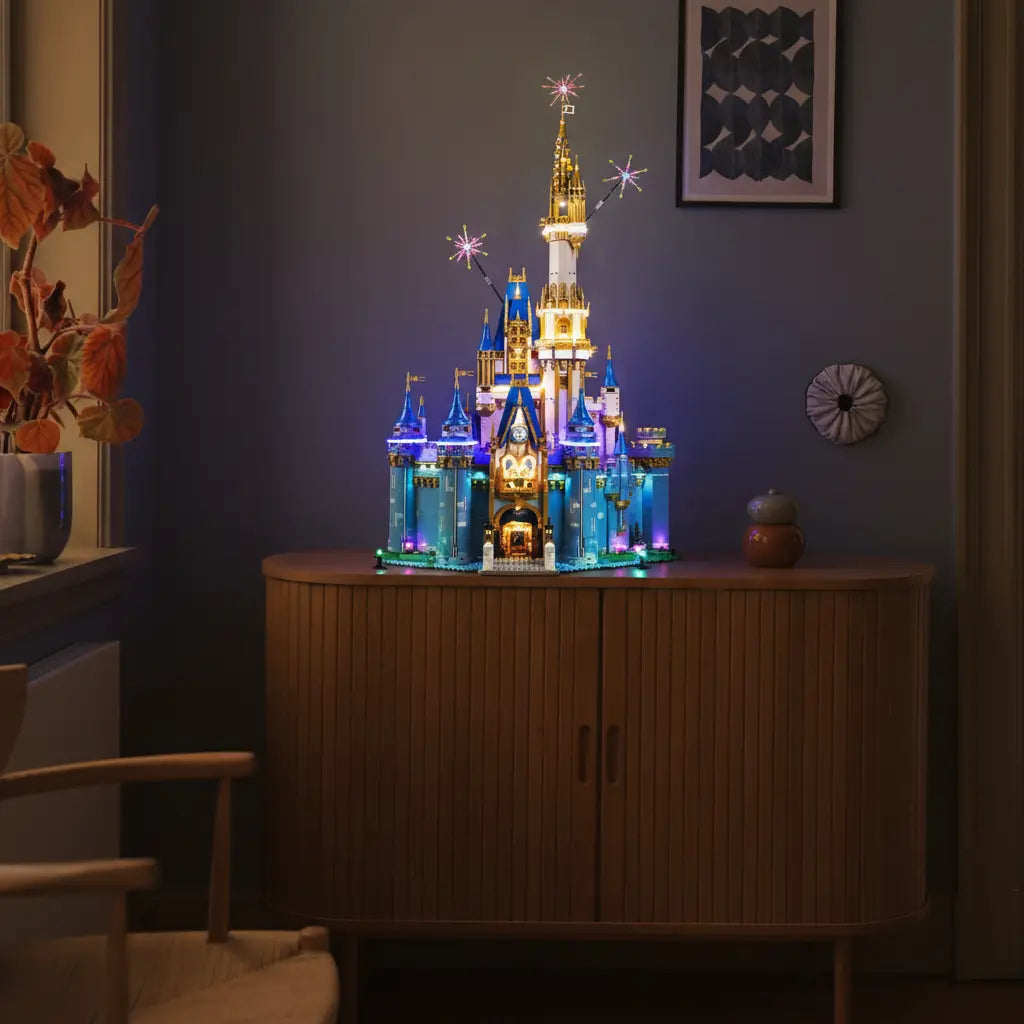 The grand ballroom inside the LEGO Disney Castle 43222 is illuminated with a warm, elegant glow for a perfect royal ball scene.