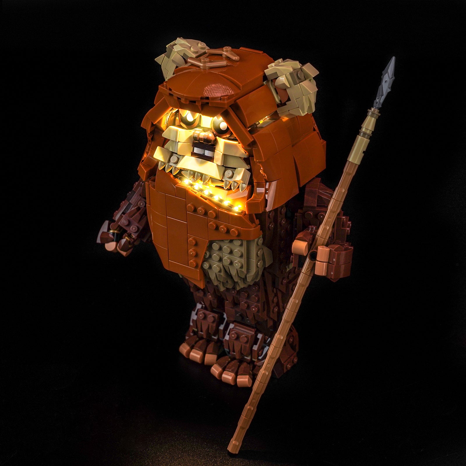 The charming LEGO Star Wars Wicket the Ewok 75430 figure, brought to life with a custom light kit by Bright My Bricks.