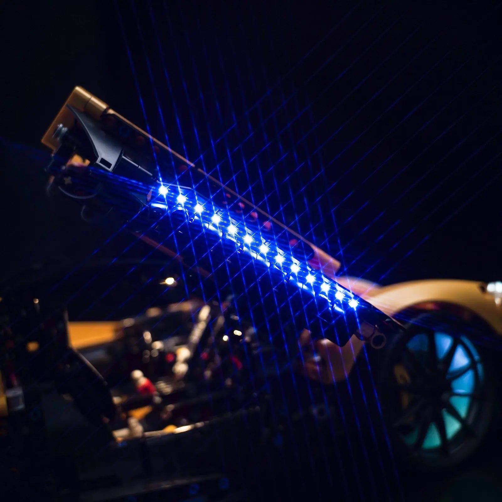 The entire silhouette of the LEGO McLaren P1 model 42172 is accentuated with vibrant lights, expertly lit by Bright My Bricks.