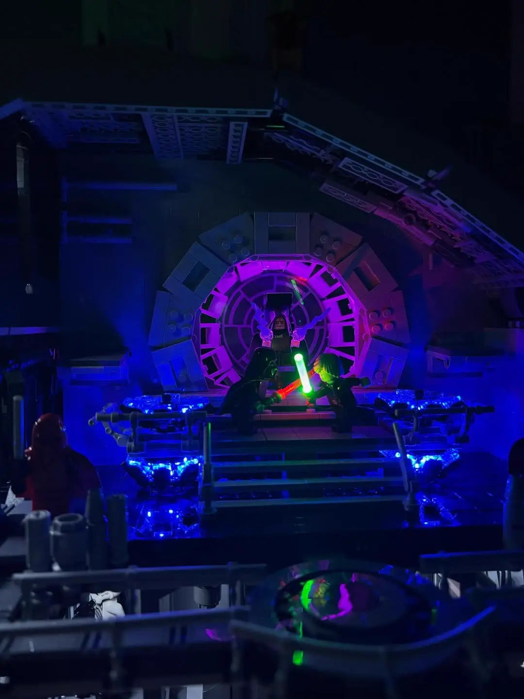 A sinister glow emanates from the Emperor's iconic throne room window on the LEGO Death Star 75419, lit by Bright My Bricks.