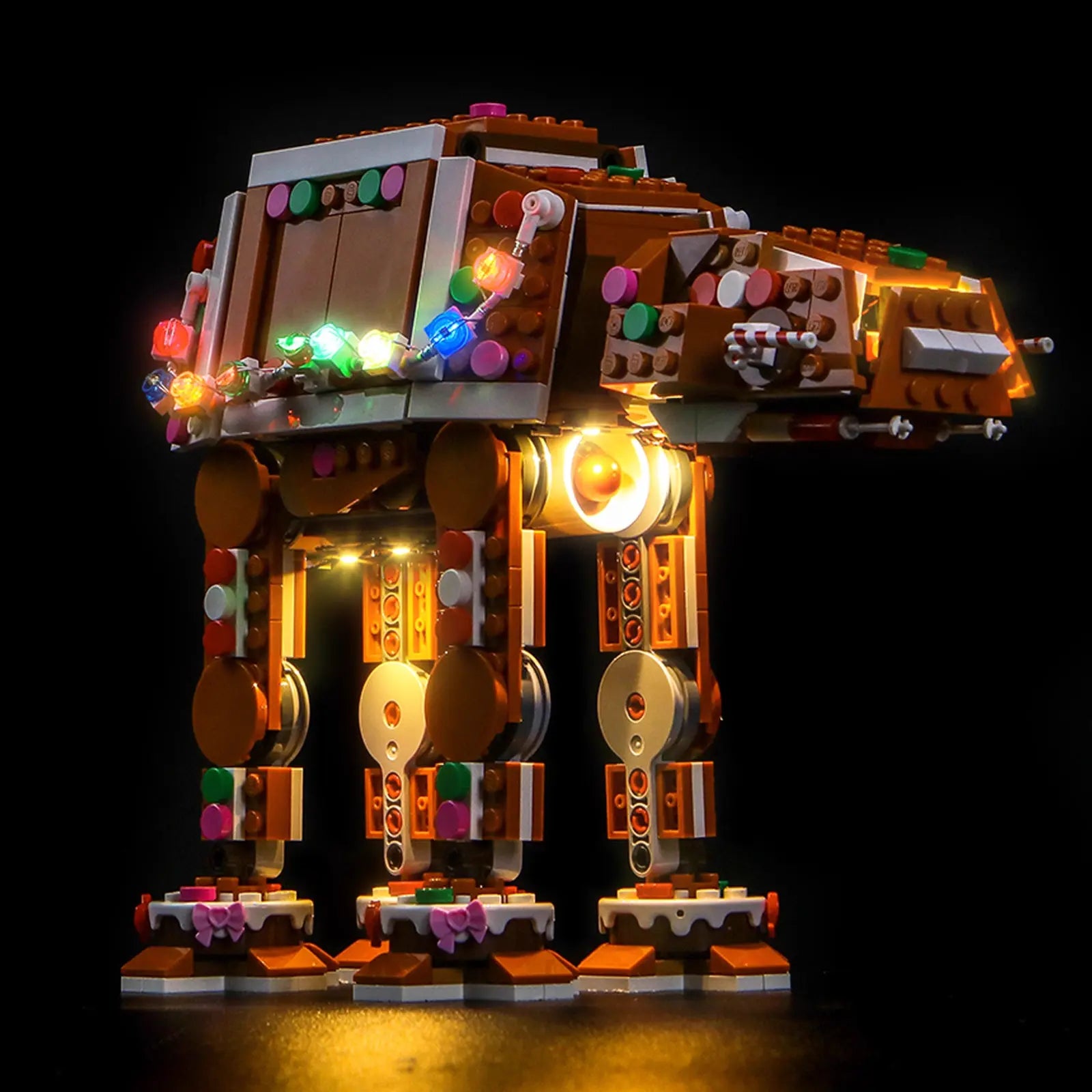 A warm, festive glow emanates from the LEGO Gingerbread AT-AT, making it a perfect holiday display with our light kit.