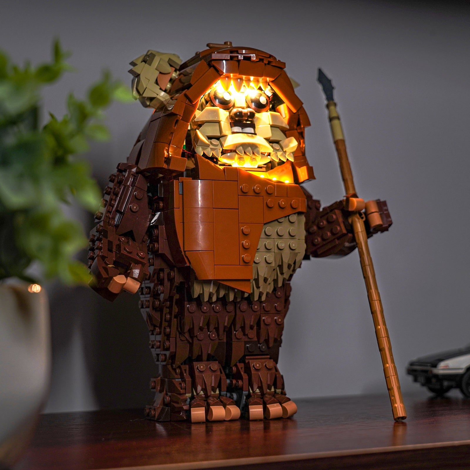 The Endor forest floor of the LEGO Wicket 75430 set, with glowing mushrooms and plants creating a magical ambiance.