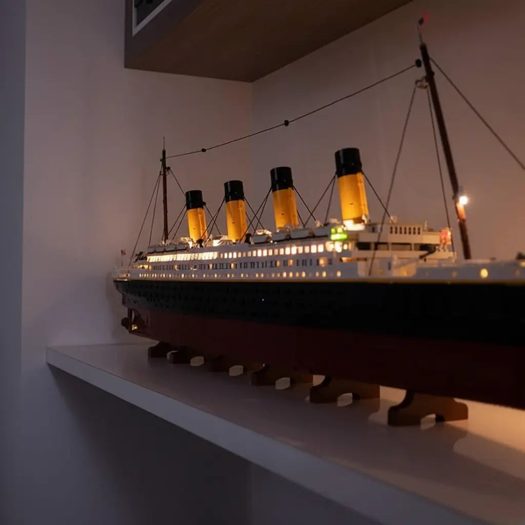 Image displaying LEGO® trains and boats upgraded with Bright My Bricks LED light kits. Perfect for fans wanting to highlight their locomotives and vessels with vivid, easy-to-install lighting effects.