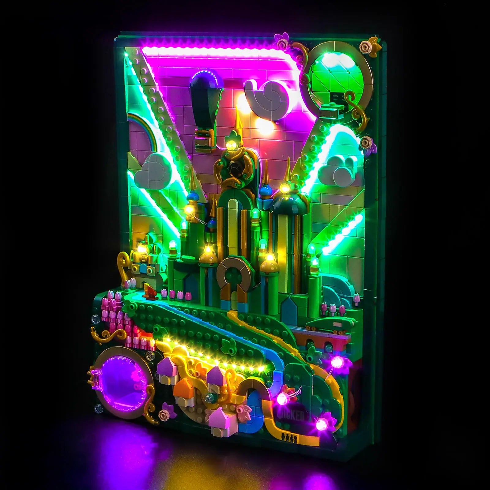 A close-up of the Emerald City's towers, shining with a brilliant, OZ-some green light from our custom light kit.