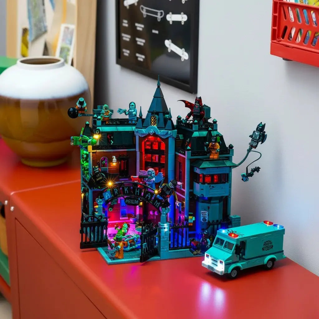 The imposing facade of the LEGO Batman Arkham Asylum 76300 given a chilling glow by the Bright My Bricks light kit.