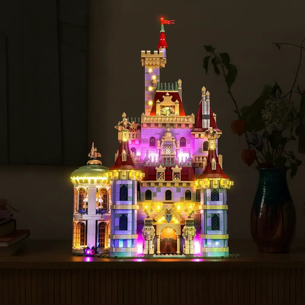 The magical LEGO Disney Beauty and the Beast Castle 43263 shines, with a warm light illuminating the grand ballroom.