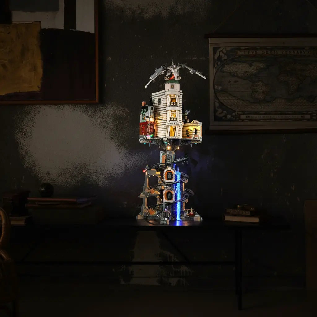 The grand LEGO Gringotts Wizarding Bank 76417, with lights illuminating the impressive building and the Ukrainian Ironbelly dragon.