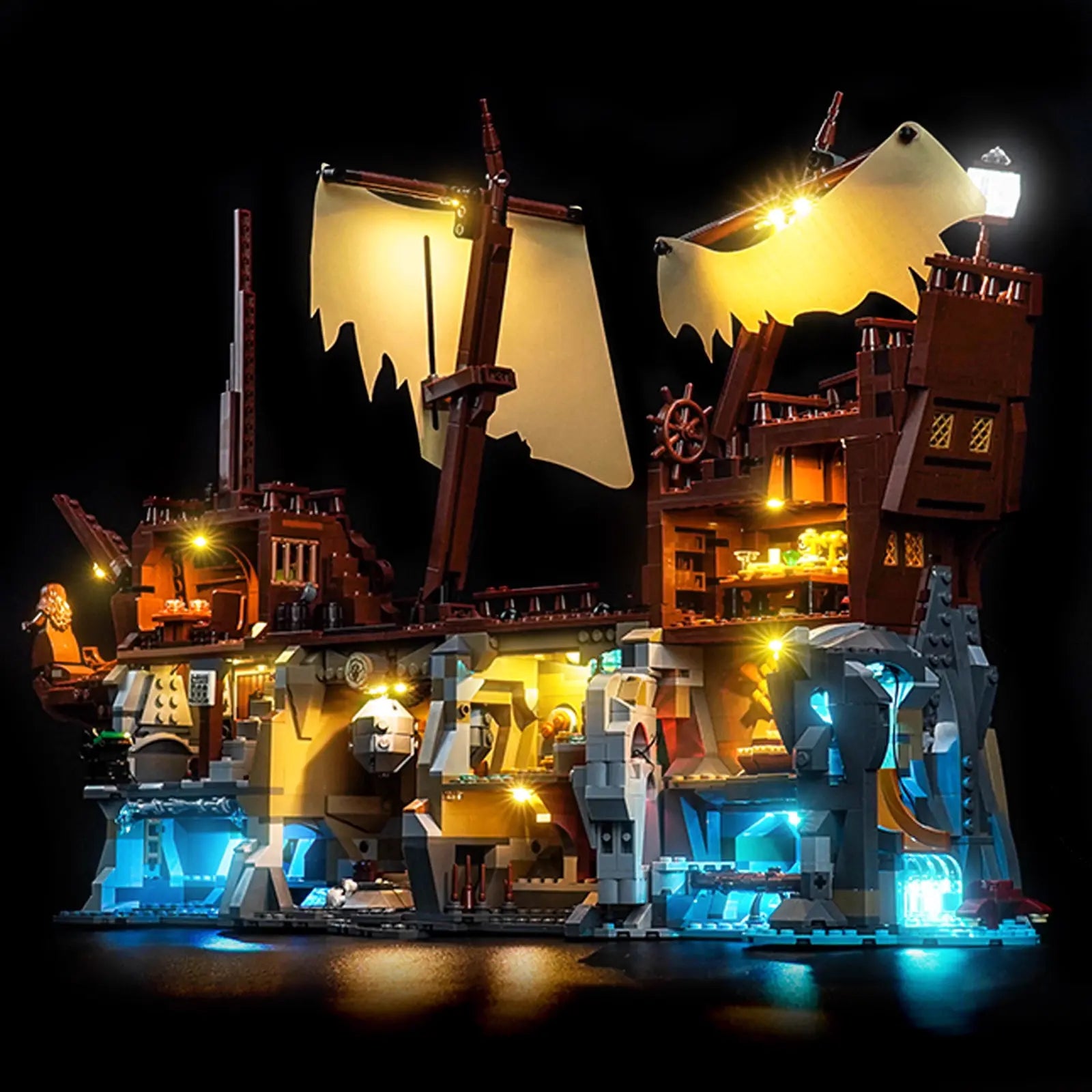 The complete LEGO Ideas The Goonies 21363 set, fully illuminated with a custom LED light kit by Bright My Bricks.
