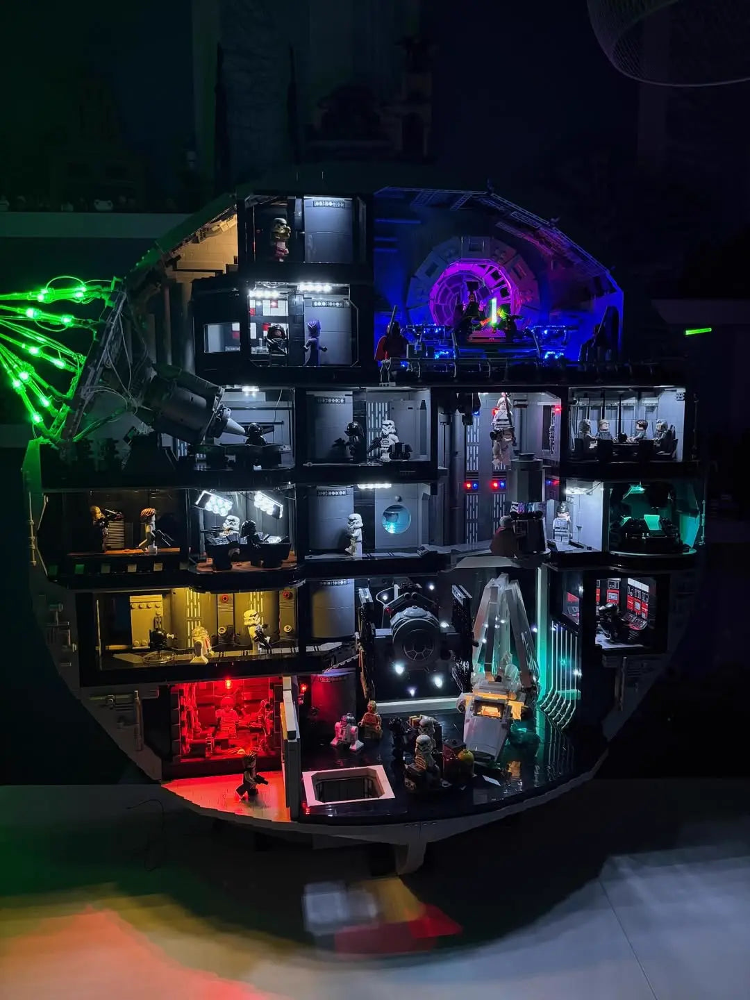 The LEGO Star Wars Death Star 75419 model fully illuminated with a custom light kit for LEGO by Bright My Bricks.