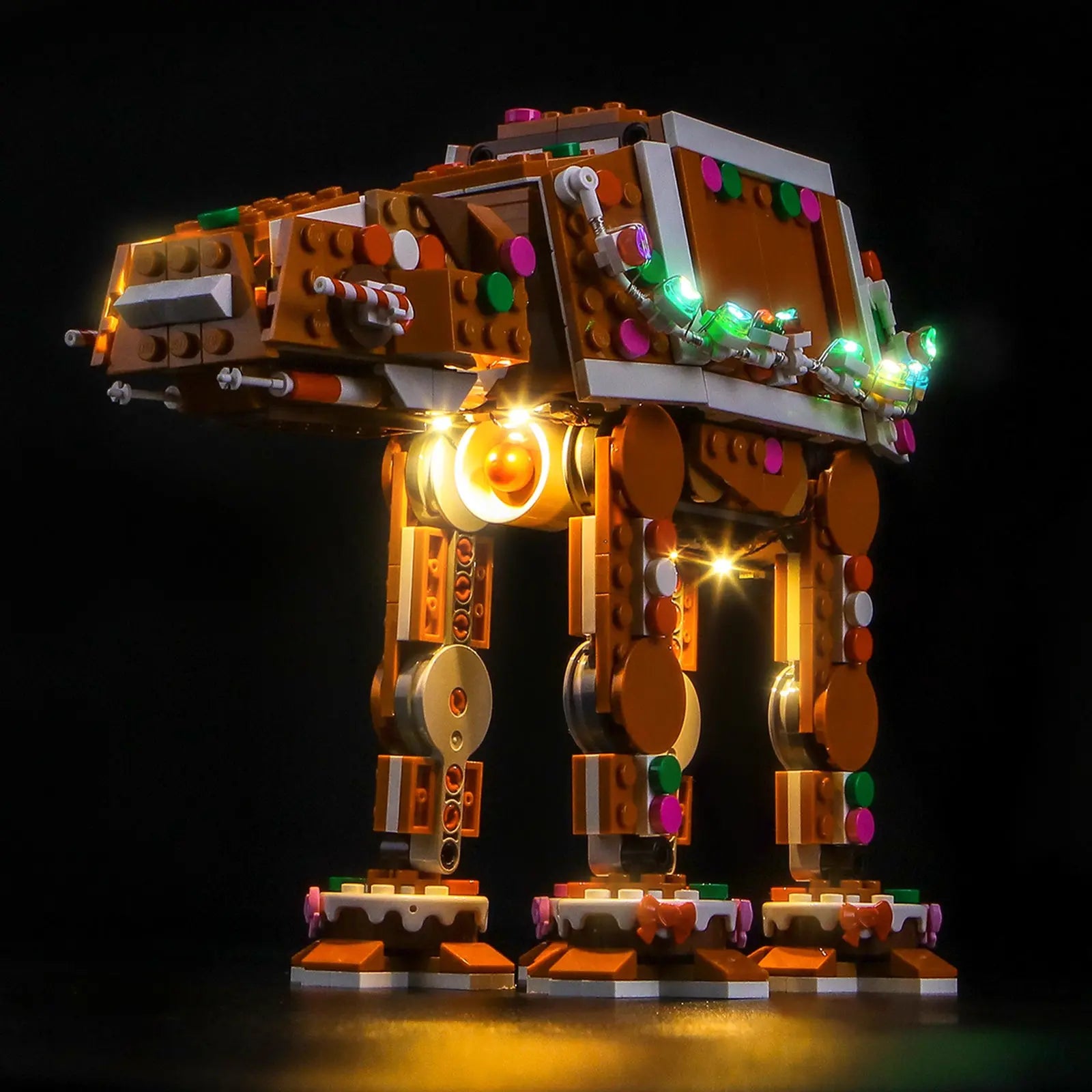 The festive LEGO Star Wars Gingerbread AT-AT 40806 is fully illuminated with a custom holiday light kit by Bright My Bricks.