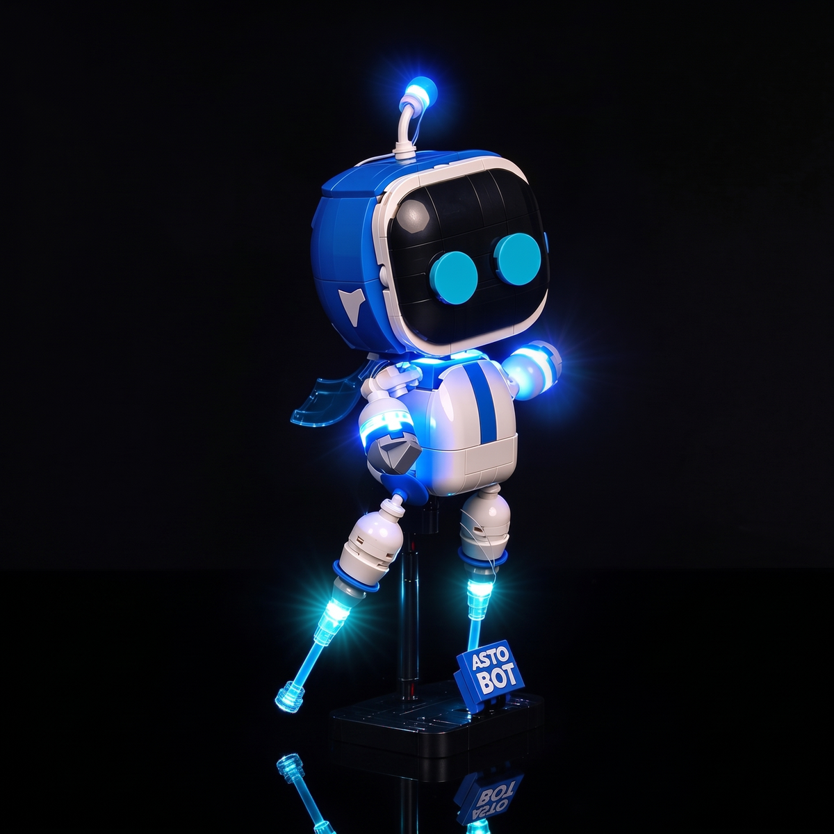 LEGO® Astro Bot™ #40899 — angled view with extended arms and glowing antenna