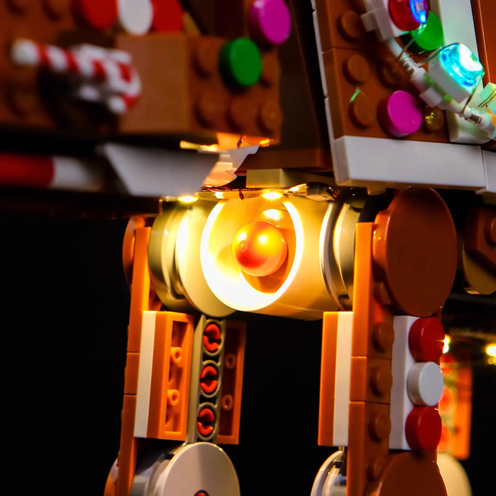 The complete Bright My Bricks light kit for the LEGO Gingerbread AT-AT, displaying the festive LEDs and components.