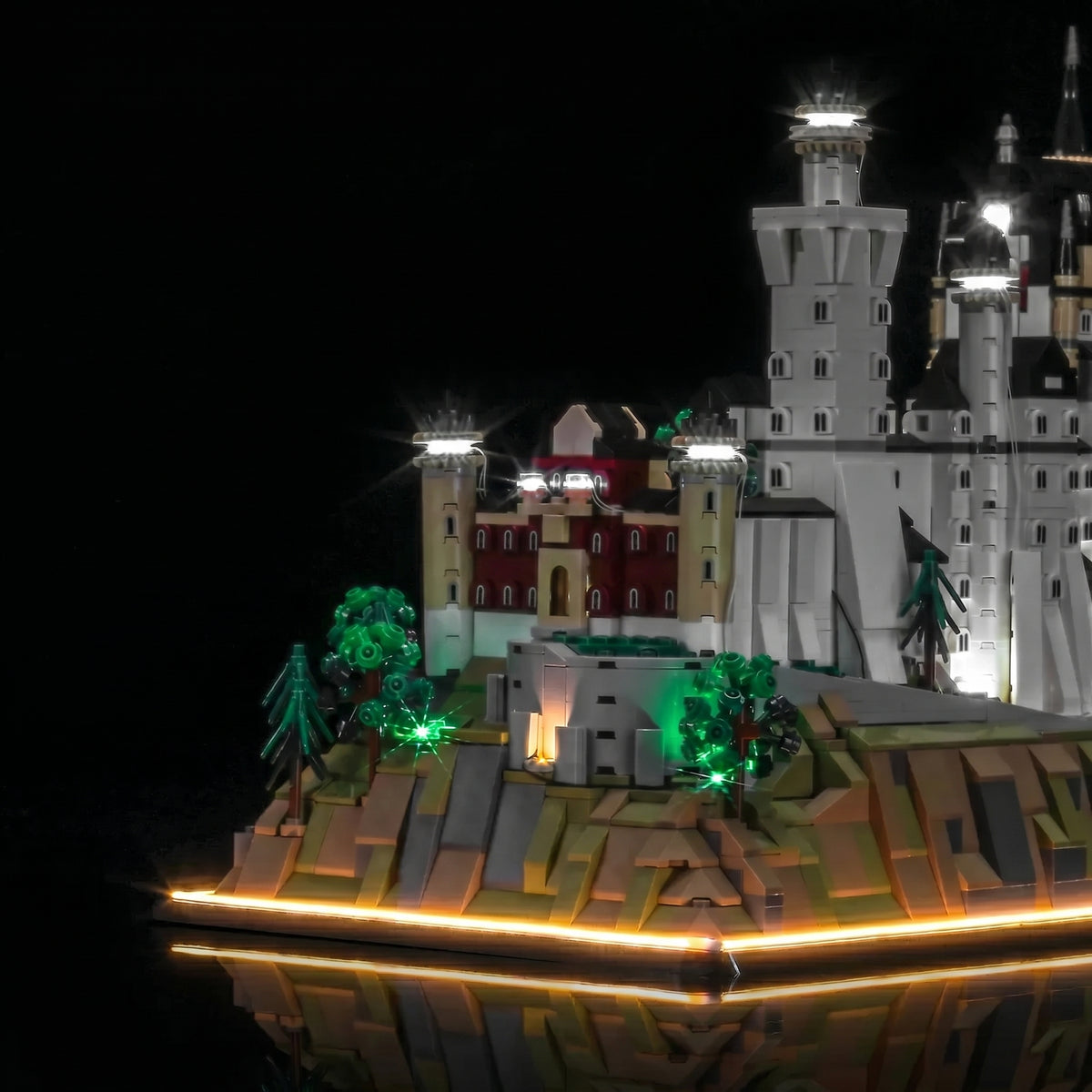 LEGO® Architecture Neuschwanstein Castle #21063 display lighting in a dark room, with the premium LED light kit