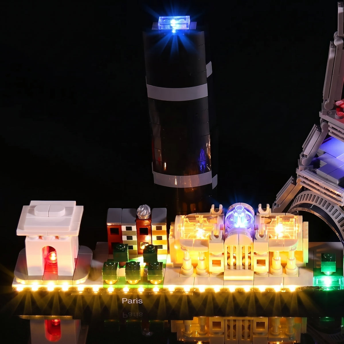 LEGO® Architecture Paris #21044 fully illuminated on display, with the LED light kit