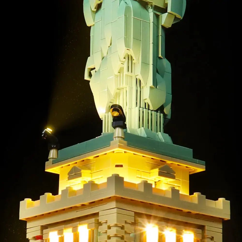 LEGO® Architecture Statue of Liberty #21042 illuminated at night, with the display light kit