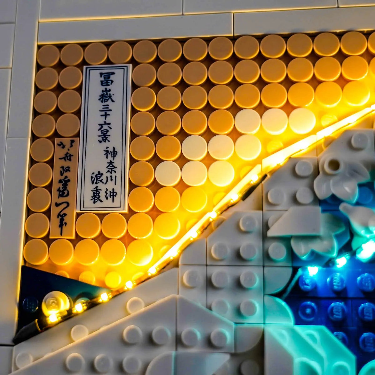 side angle with lights on: Bright My Bricks LED light kit for LEGO® Art Hokusai #31208