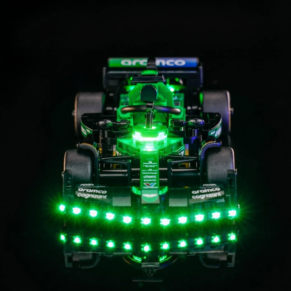 LEGO® Aston Martin Aramco F1 AMR24 Race Car #77245 night-mode display glow, with the LED lights