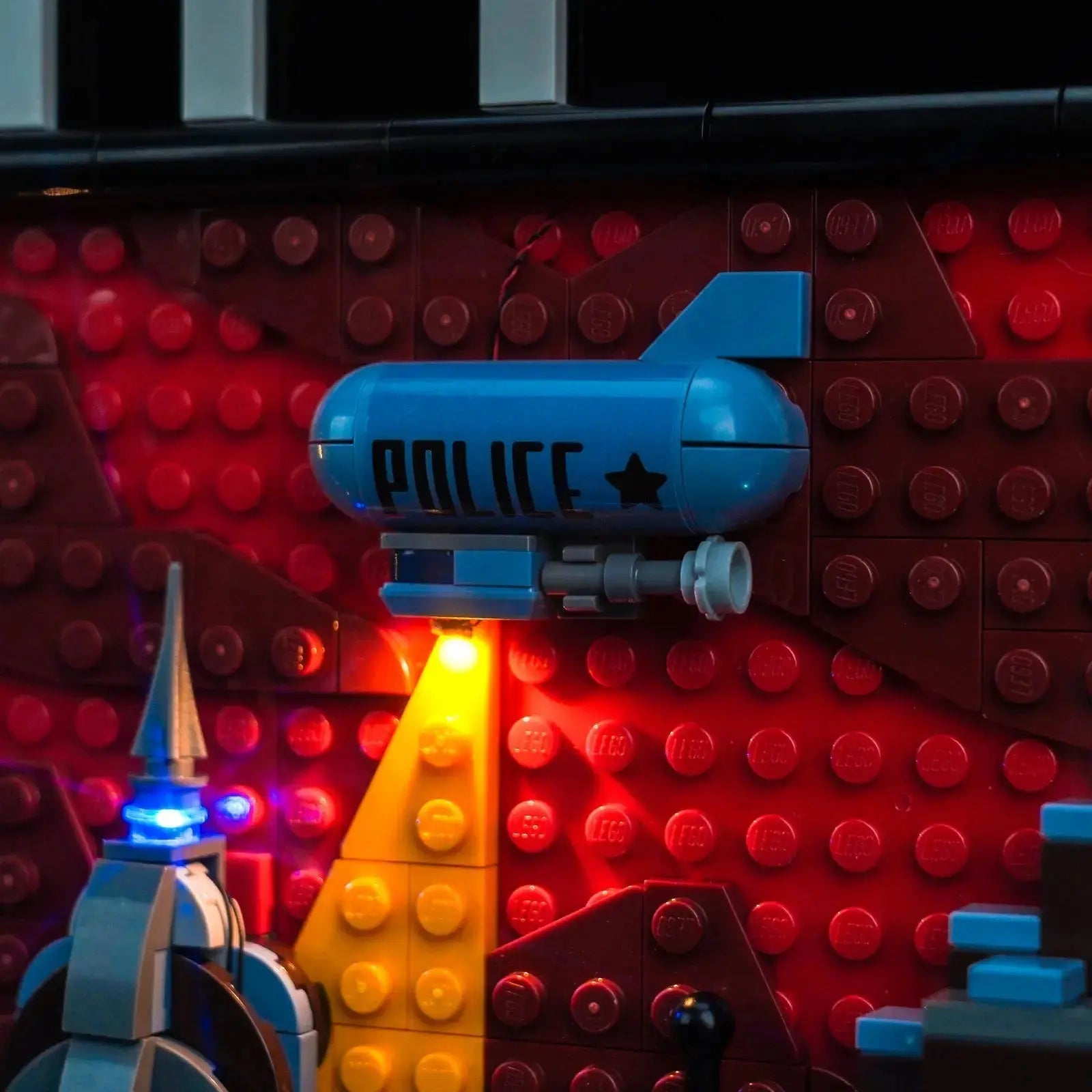 LEGO Batman: The Animated Series Gotham City #76271 illuminated at night