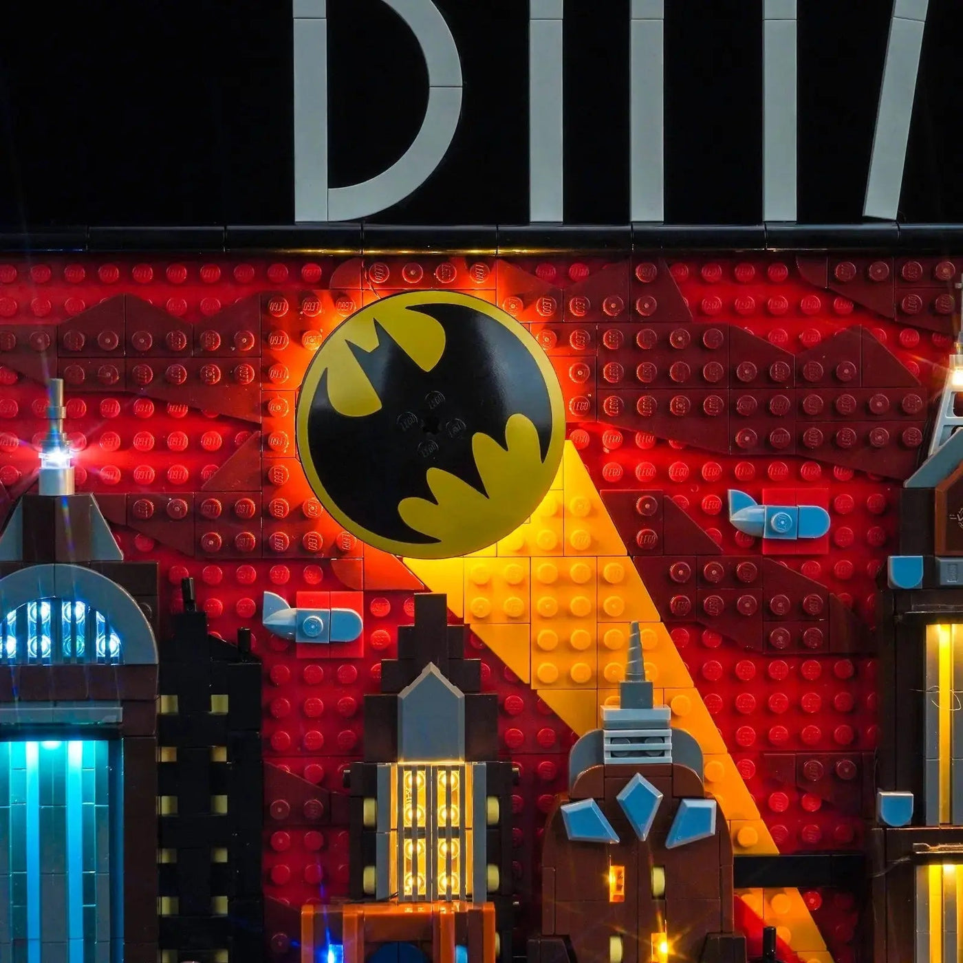 LEGO® Batman: The Animated Series Gotham City #76271 display lighting in a dark room, with the premium LED light kit