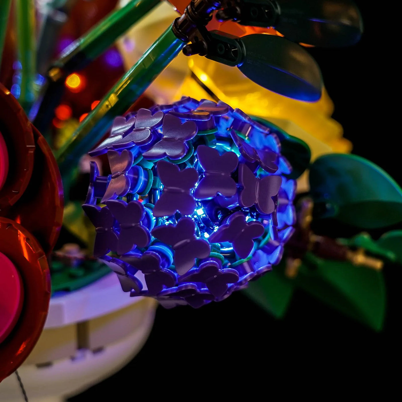 LEGO® Botanicals Flower Arrangement #10345 — showcase lighting view (USB-powered LED light kit)
