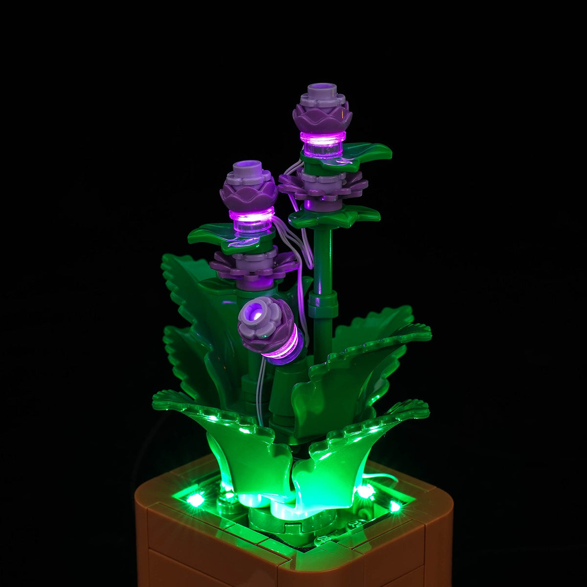 Purple-lit buds and green foliage above the brown pot — LEGO® Cozy Plants #10371