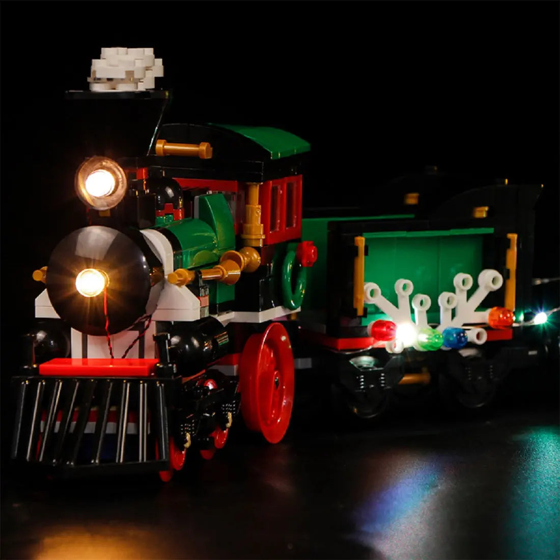 LEGO Creator Expert Winter Holiday Train #10254 illuminated at night