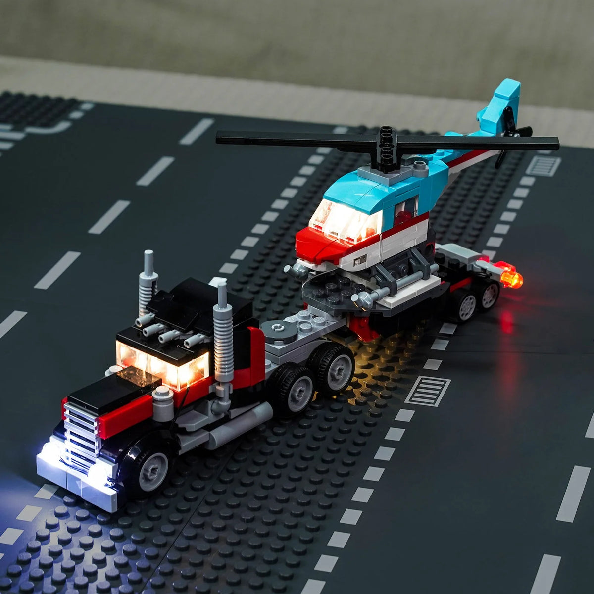 LEGO® Creator Flatbed Truck with Helicopter #31146 close-up of the LED lighting detail, with the display light kit