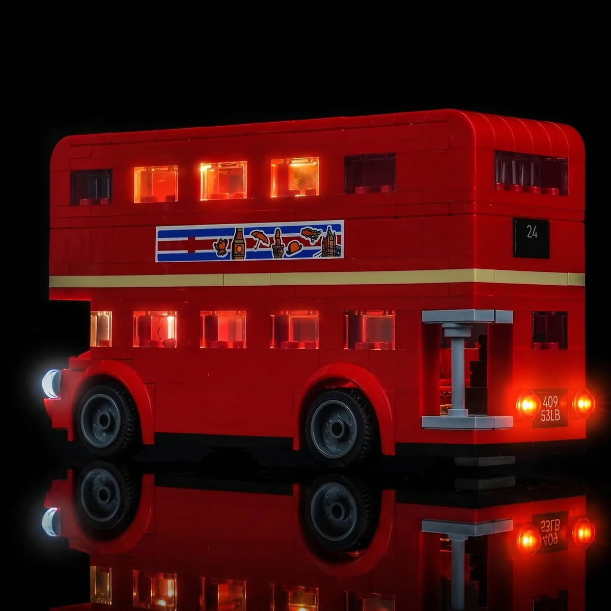 LEGO® Creator London Bus #40953 side angle with lights on, with the RGB LED light kit