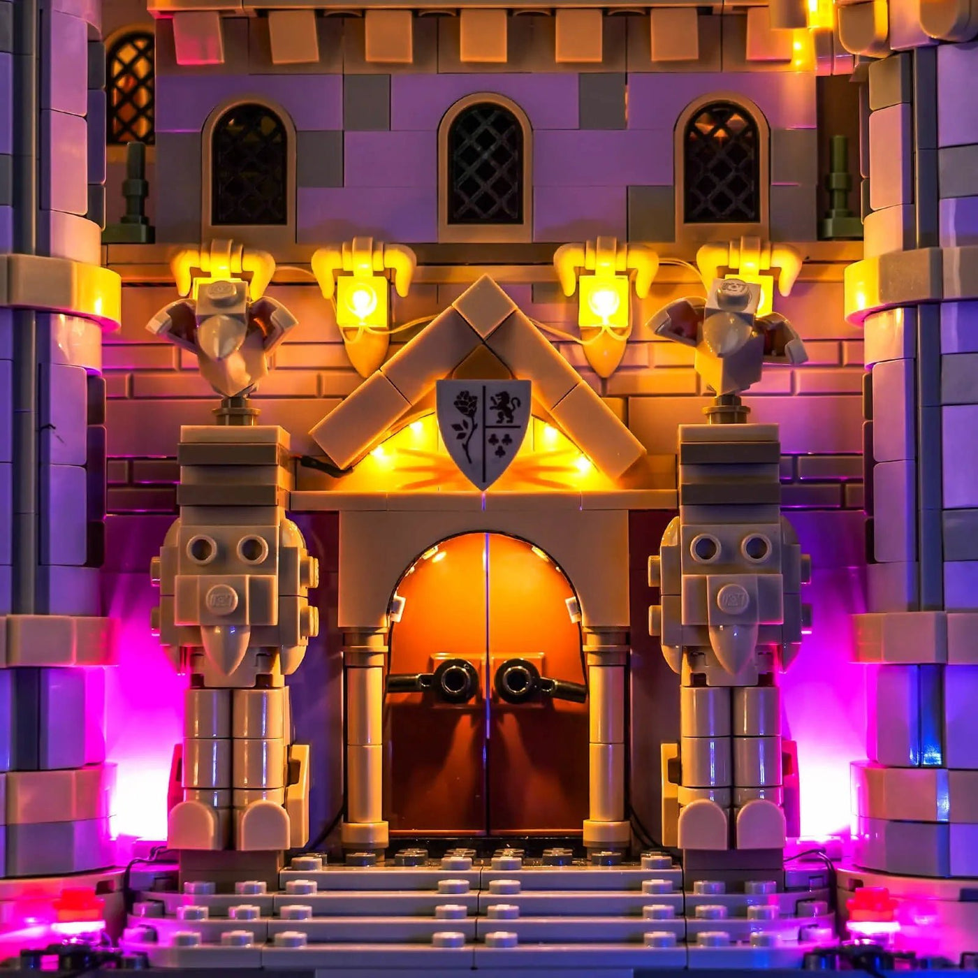 LEGO® Disney Beauty and the Beast Castle #43263 fully illuminated on display, with the USB-powered LED light kit