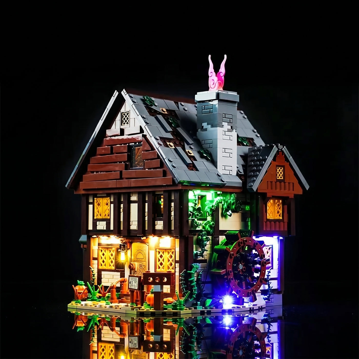 LEGO® Disney Hocus Pocus: The Sanderson Sisters' Cottage #21341 — display lighting in a dark room (LED lights)