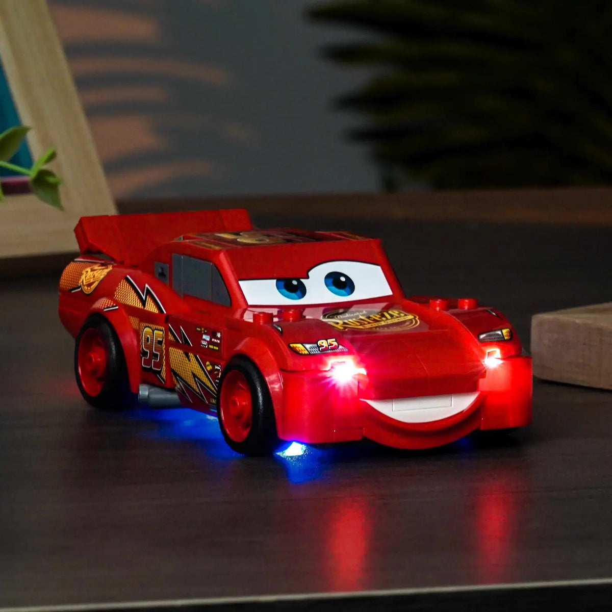 LEGO® Disney Lightning McQueen #77255 warm LED glow detail, with the DIY LED light kit