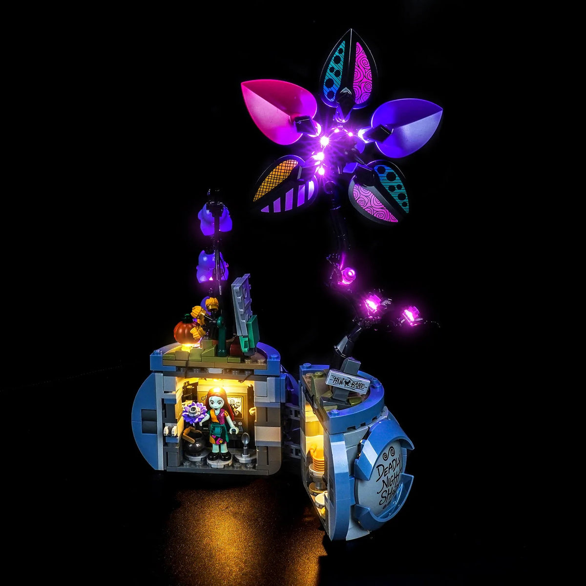 LEGO® Disney Sally's Flowerpot #43288 — fully illuminated on display (LED lights)