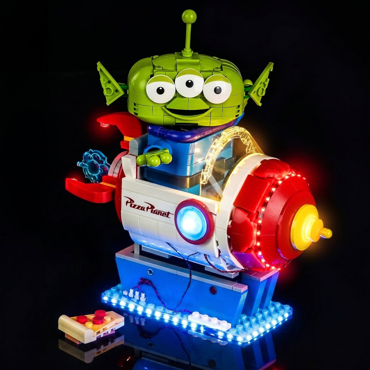 LEGO® Disney Toy Story Alien with Pizza Planet Rocket Ride #43307 — fully illuminated on display (DIY LED light kit)