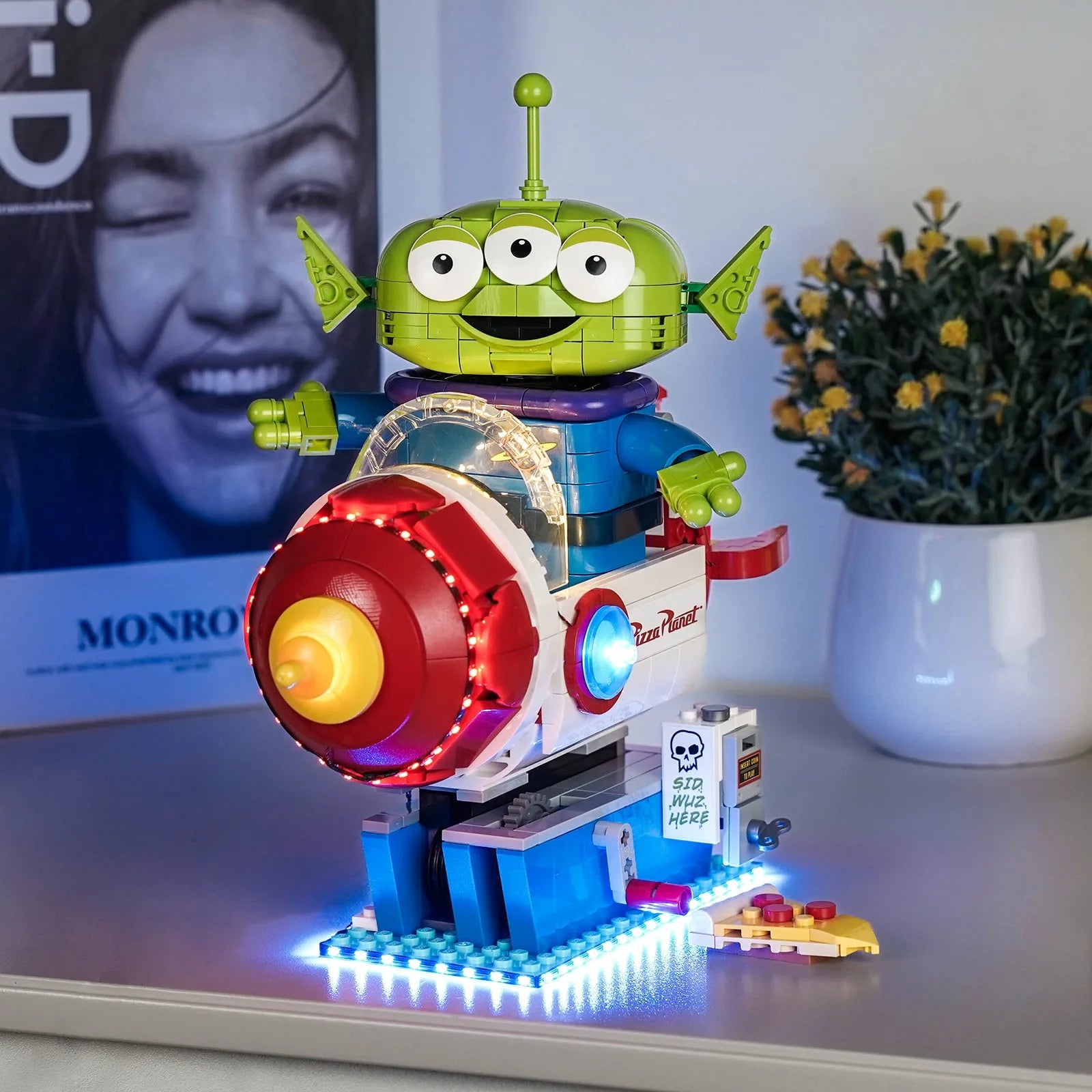 Close-up of LED lights on LEGO Disney Toy Story Alien with Pizza Planet Rocket Ride #43307