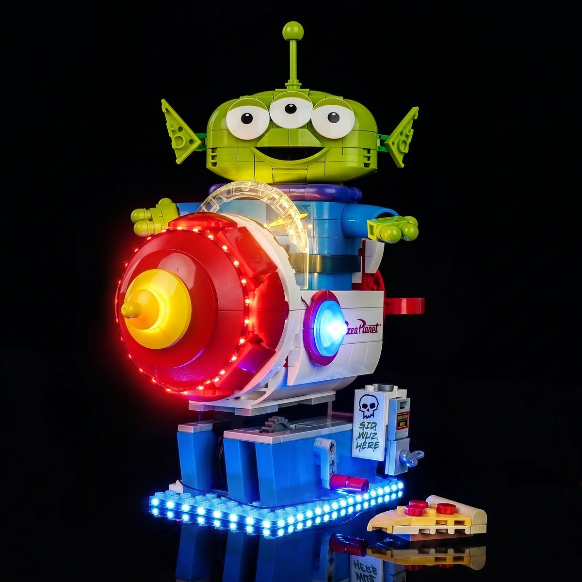 LEGO® Disney Toy Story Alien with Pizza Planet Rocket Ride #43307 LED strips and bricks detail, with the light kit