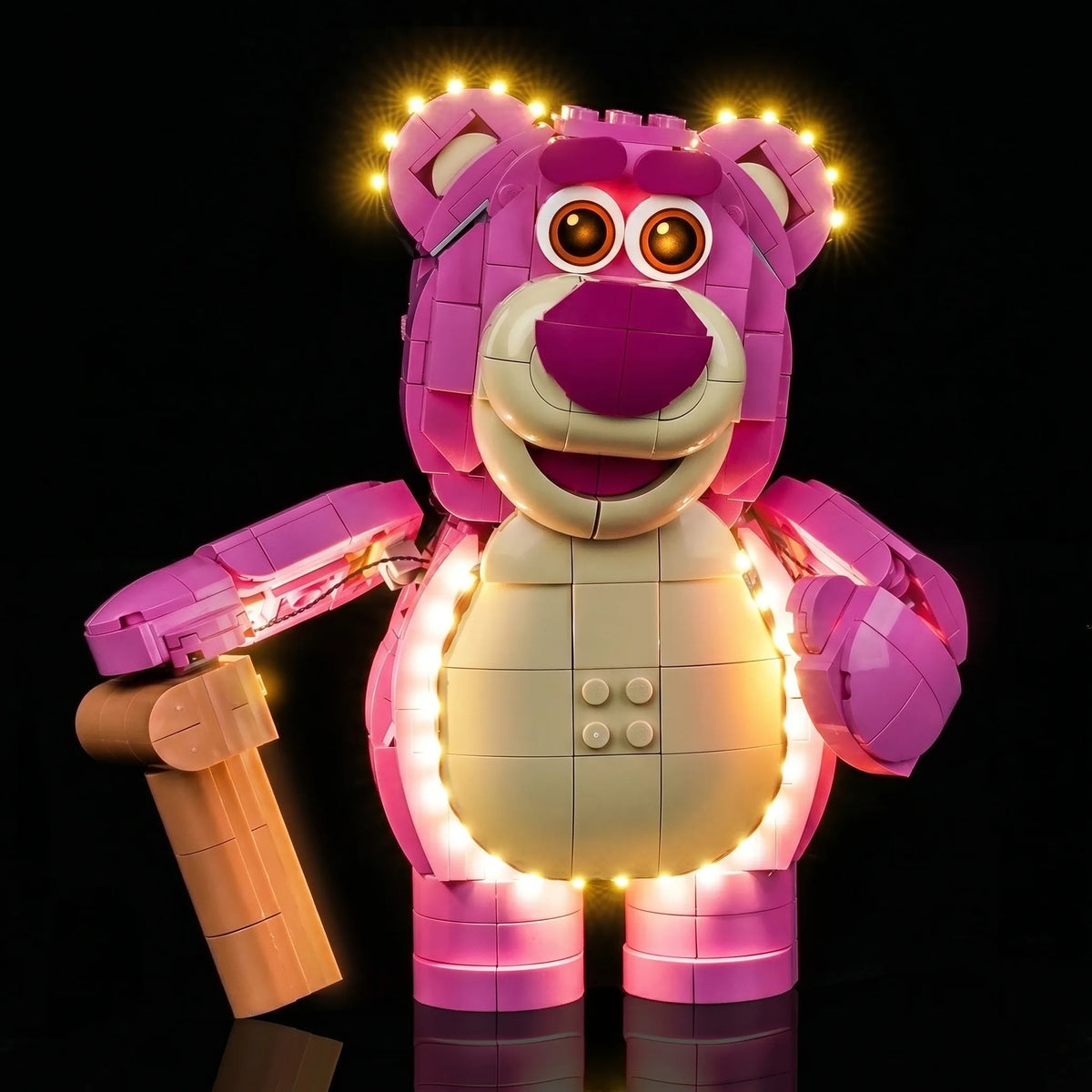 LEGO® Disney Toy Story Lotso #43306 LED kit powered on, with the USB-powered LED light kit