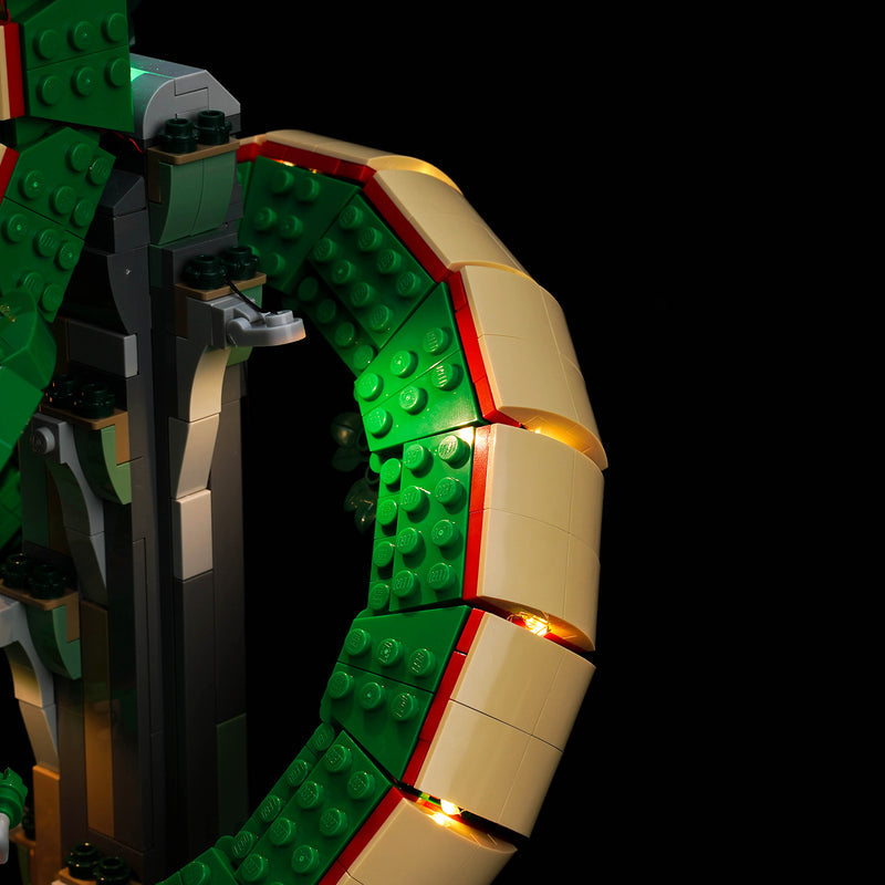 Close-up of warm light along Shenron’s pale belly and support — LEGO® Dragon Ball: Shenron & Goku #11390, LED light kit