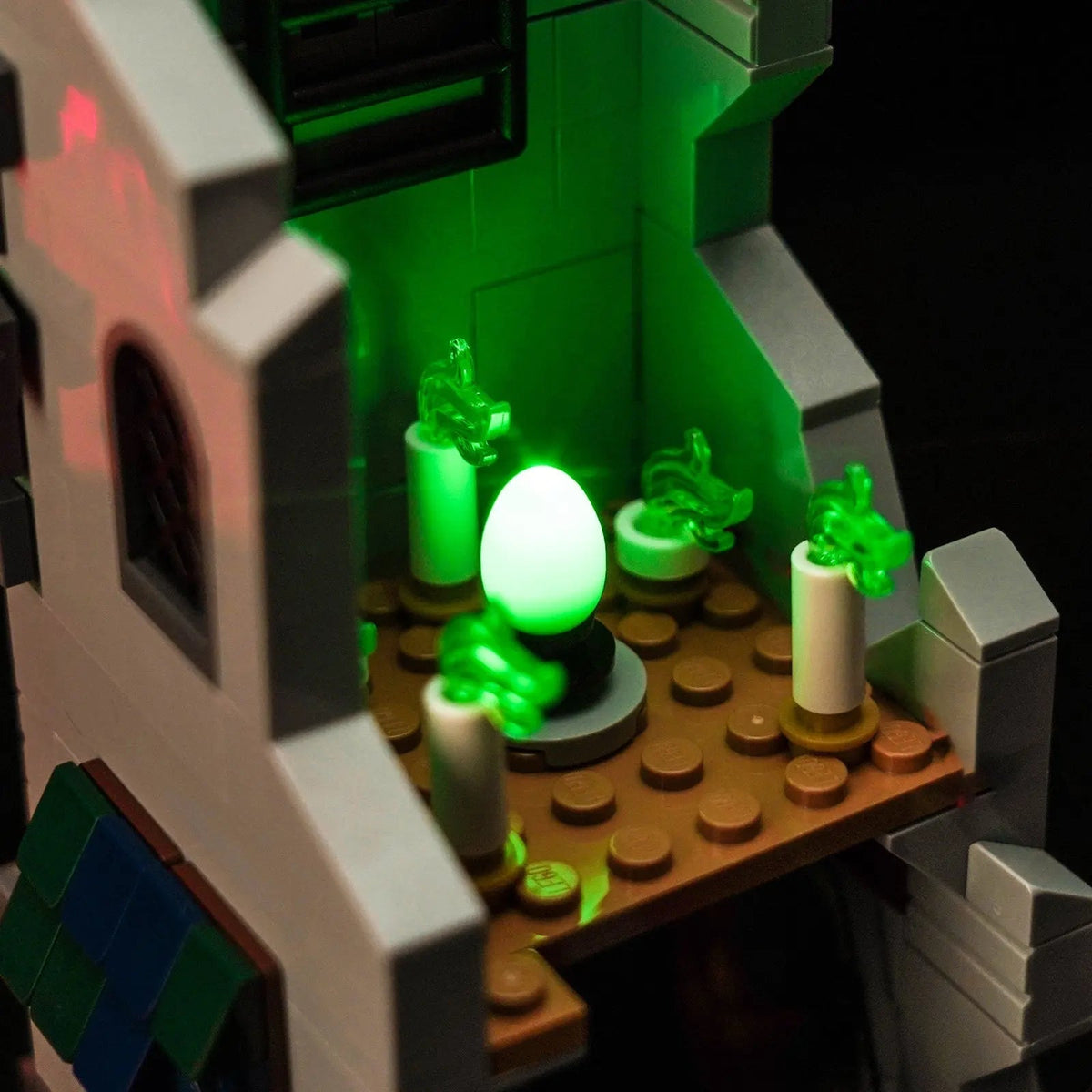 LEGO® Dungeons & Dragons: Red Dragon's Tale #21348 installed and glowing, with the LED lights
