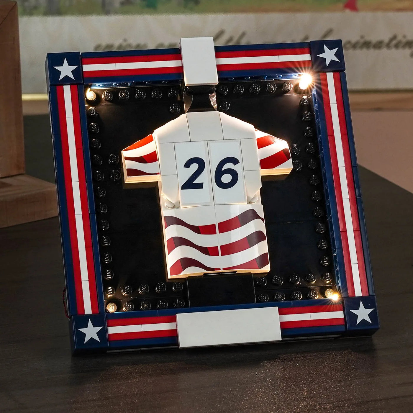 LEGO® Editions 2026 U.S. Soccer National Team Jersey #43033 — side angle with lights on (LED lighting kit)