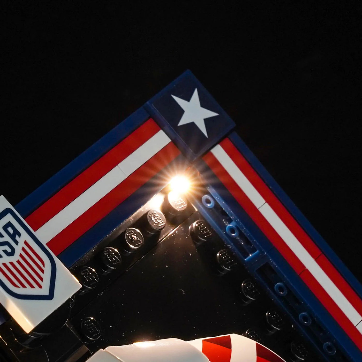 LEGO® Editions 2026 U.S. Soccer National Team Jersey #43033 close-up of the LED lighting detail, with the custom LED lighting