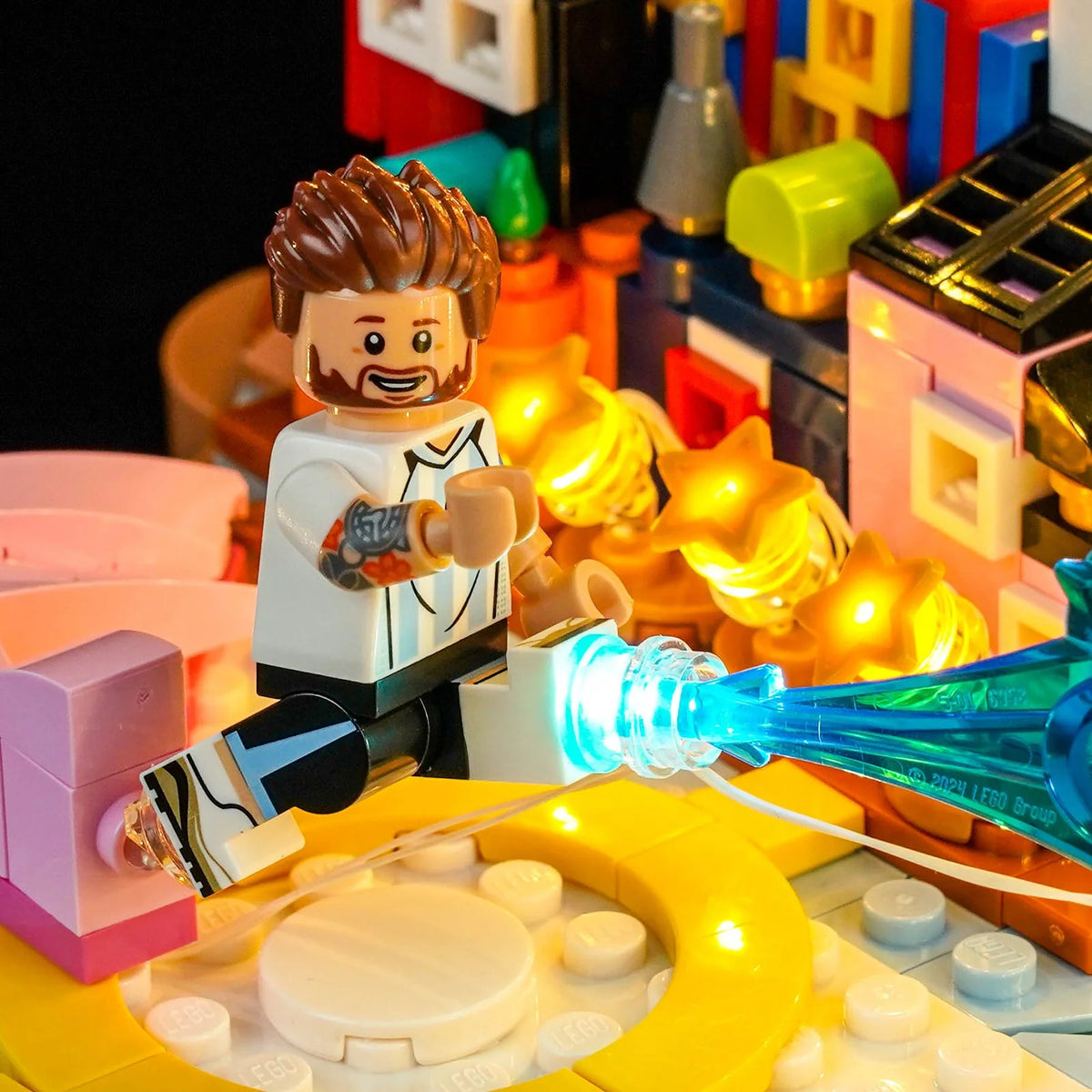 LEGO® Editions Lionel Messi #43011 illuminated at night, with the LED lighting kit