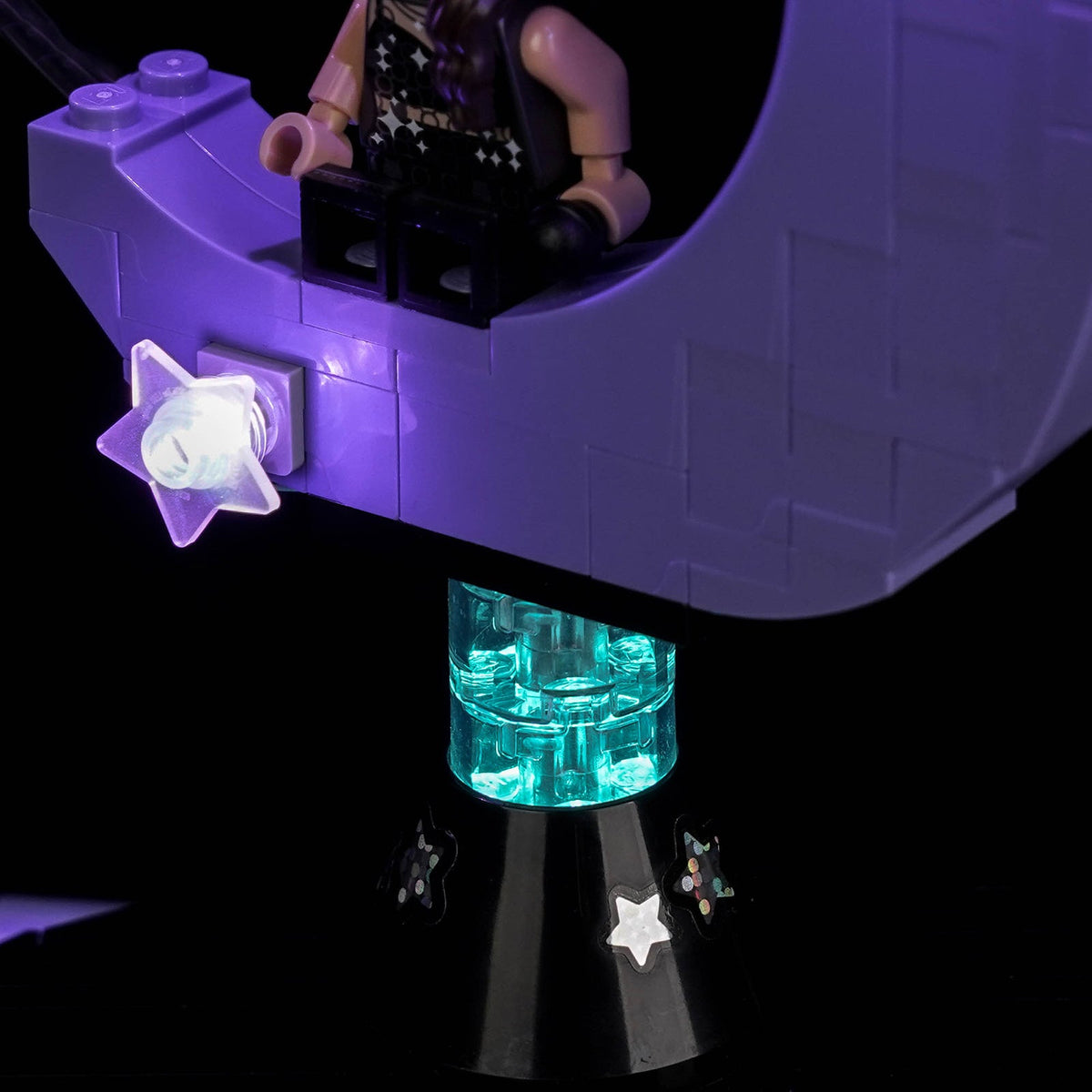 LEGO® Editions Olivia Rodrigo's Concert Moon #43029 display lighting in a dark room, with the premium LED light kit