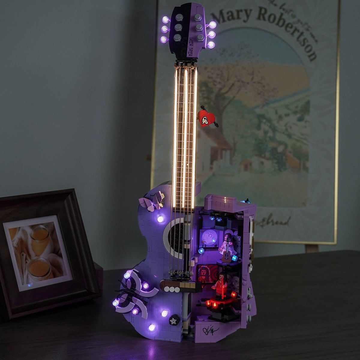 LEGO® Editions Olivia Rodrigo's Dual Guitar #43031 display lighting in a dark room, with the premium LED light kit
